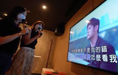 China to ban music that “insults or defames others” in karaoke venues - www.nme.com - China