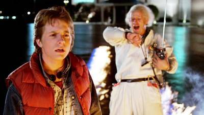 Michael J. Fox and Christopher Lloyd Have 'Back to the Future' Reunion in Another Set of Wheels - www.etonline.com