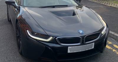 BMW seized after driver speeds through red light - right in front of police - www.manchestereveningnews.co.uk - Manchester