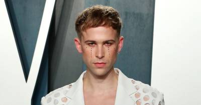 Tommy Dorfman Reflects on the Power of Makeup: ‘It Can Be an Amazing Tool for Affirmation’ - www.usmagazine.com