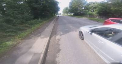Shocking moment maniac motorist comes 'within inches' of terrified Scots cyclists on road - www.dailyrecord.co.uk - Scotland