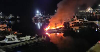 Dramatic photos as boat bursts into flames and fire crews race to Scots harbour - www.dailyrecord.co.uk - Scotland