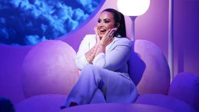 Demi Lovato Gets Large New Hand Tattoo -- See the Song Lyrics! - www.etonline.com