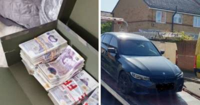 Suspected drug dealer arrested after police seize BMW and £20,000 in cash - www.manchestereveningnews.co.uk