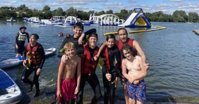 Joe Swash shares rare photo of son Harry, 14, as pair enjoy day out at water park - www.ok.co.uk