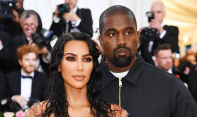 Kim Kardashian Wears Wedding Dress, Kanye West Lights Himself on Fire at 'Donda' Event - www.justjared.com