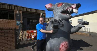 Scots binmen fed up of rat attacks send message to council with giant inflatable rodent - www.dailyrecord.co.uk - Scotland