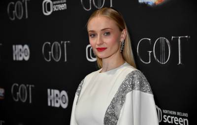 ‘Game Of Thrones’ star Sophie Turner recalls “happiest of days” with nostalgic cast photo - www.nme.com - county Stark - city Sansa, county Stark