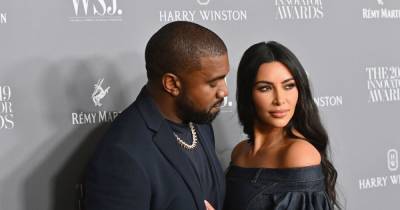 Kim Kardashian and Kanye West 'working on relationship' as she attends Donda event in wedding gown - www.ok.co.uk - USA
