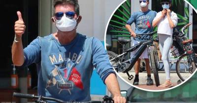 Simon Cowell in great spirits on bike ride - a year after back surgery - www.msn.com - California