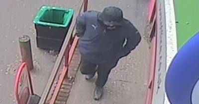 Police release CCTV after man robs business at knifepoint and flees with £500 cash - www.manchestereveningnews.co.uk - county Lane