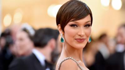 Bella Hadid Debuted Orange Bangs for What’s Easily Her Coolest Hairstyle Yet - www.glamour.com - Britain