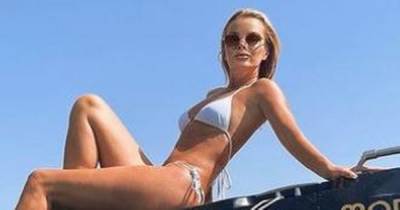 Amanda Holden causes frenzy as she poses for sexy bikini snap on holiday - www.manchestereveningnews.co.uk - Britain