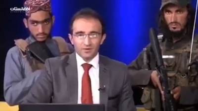 Afghan TV Anchor Interviews Taliban Member While Surrounded by Armed Fighters (Video) - thewrap.com - Afghanistan