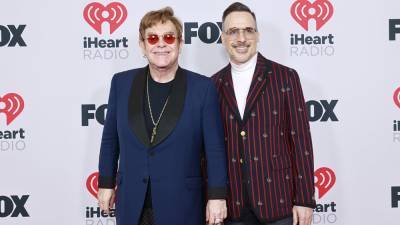 Elton John, David Furnish and Their Sons Twin in Versace for Rare Family Photo - www.etonline.com - France