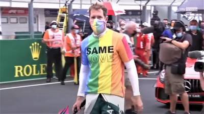 F1 star Sebastian Vettel reprimanded for wearing Pride shirt, says he’d “do it again” - www.metroweekly.com - Hungary
