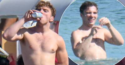 Rocco Richie downs drinks and frolics in the sea in Sardinia - www.msn.com