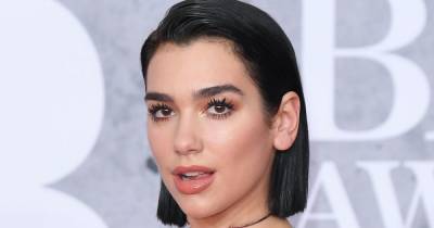 Dua Lipa wows with ‘unreal’ makeup-free skin as she cosies up to boyfriend on holiday - www.ok.co.uk
