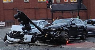 Scene of devastation after Mercedes ploughs into traffic light - www.manchestereveningnews.co.uk - city This