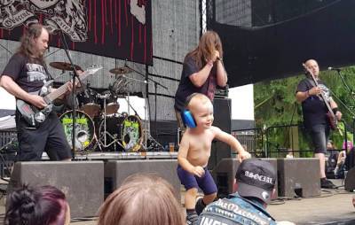 Watch a toddler storm the stage at an extreme metal festival - www.nme.com - New Zealand
