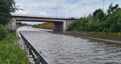 Notorious A555 Airport Relief Road floods again after heavy downpours - www.manchestereveningnews.co.uk