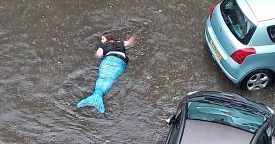 Scots resident can't believe his eyes after spotting 'mermaid' swimming on flooded street - www.dailyrecord.co.uk - Scotland - county Garden