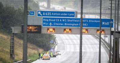 Traffic had to be held and police were called after man and woman were seen having row on hard shoulder of M60 - www.manchestereveningnews.co.uk