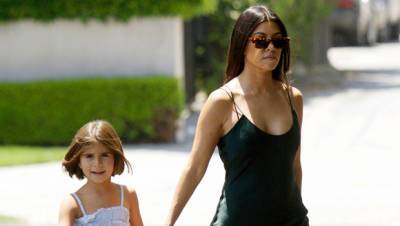 Kourtney Kardashian Wears Bikini Top As She Twins With Penelope, 9, In Blue Bucket Hats — Photo - hollywoodlife.com