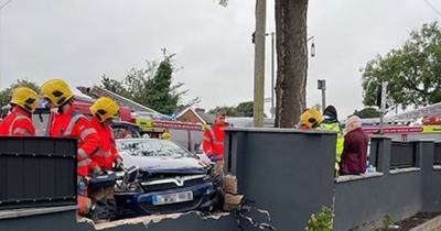 Teens, 15 and 16, arrested after two-car smash into garden wall leaves pensioner in hospital - www.manchestereveningnews.co.uk - Manchester