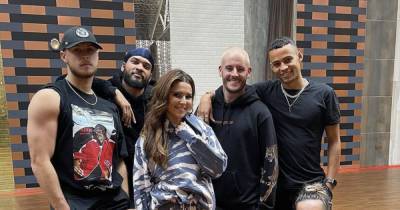Cheryl smiles with dancers during rehearsals after brother reveals he's homeless - www.ok.co.uk
