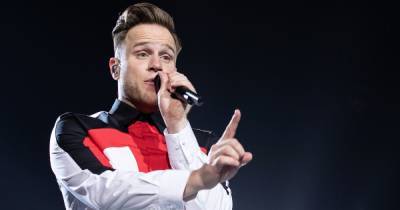 Olly Murs praised for halting gig after realising 14 year old fan was having seizure in crowd - www.ok.co.uk - Britain