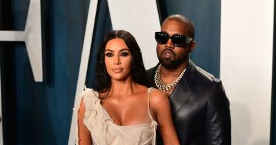 Kanye West 'wants to get back' with Kim Kardashian after she was seen wearing wedding dress - www.ok.co.uk - Chicago