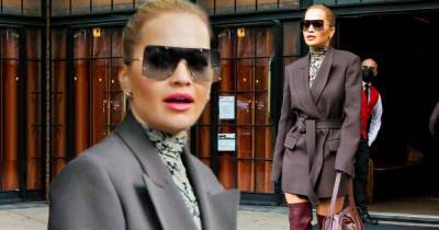 Rita Ora wows in grey trench coat, knee-high boots and edgy sunglasses - www.msn.com - New York