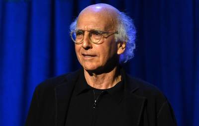 Larry David seen plugging his ears at New York Fashion Week in viral clip - www.nme.com - New York