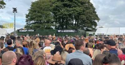 'Nightmare' Reminisce festival slammed as fans complain of huge queues and 'fearing for their safety' - www.manchestereveningnews.co.uk