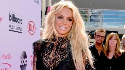 Britney Spears Debuts a New Red-Dipped Hair Cut - www.glamour.com