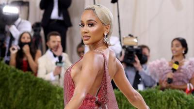 Saweetie Shares the Special Meaning Behind Her 2021 Met Gala Cape (Exclusive) - www.etonline.com