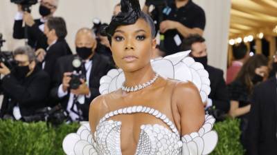 Gabrielle Union Reveals Her Stunning Met Gala Gown Took '1,400 Hours' to Create (Exclusive) - www.etonline.com