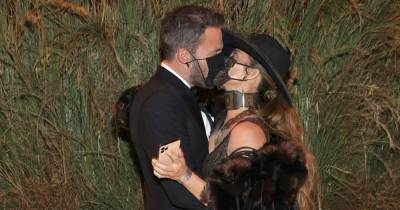 Jennifer Lopez and Ben Affleck pack on the PDA with bizarre masked kiss at star-studded Met Gala - www.ok.co.uk