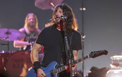 Dave Grohl reflects on writing a book in ‘The Storyteller’ trailer - www.nme.com - Britain