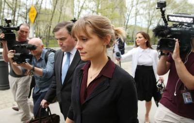 ‘Smallville’ actress Allison Mack starts prison sentence early in sex cult case - www.nme.com - California