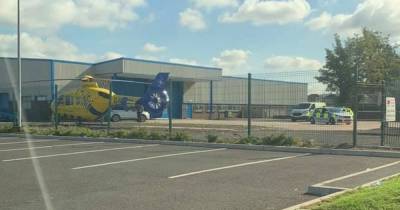 Air ambulance called to medical emergency at Wigan industrial estate with one in hospital - www.manchestereveningnews.co.uk