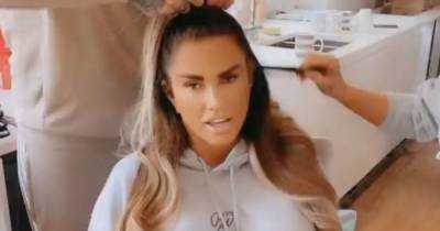 Katie Price reveals huge Harvey artwork as she moves back into mucky mansion - www.ok.co.uk