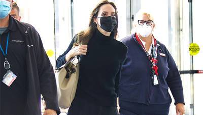 Angelina Jolie Rocks Black Turtleneck Matching Skirt At LAX After Meeting With U.S. Gymnasts - hollywoodlife.com - New York - Los Angeles - Washington