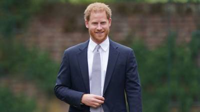 Prince Harry Makes Stylish Virtual Appearance to Present Honor at GQ Men of the Year Awards - www.etonline.com