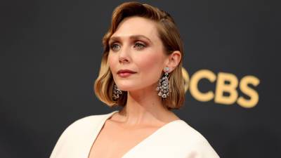 Elizabeth Olsen hits Emmys red carpet in dress designed by sisters Mary-Kate and Ashley Olsen - www.foxnews.com