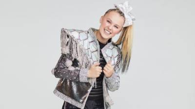 JoJo Siwa Reacts to Earning Highest Score of the Night After Historic 'DWTS' Debut Performance (Exclusive) - www.etonline.com