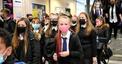 Masks return to Greater Manchester high school after spike in Covid cases - www.manchestereveningnews.co.uk - Manchester