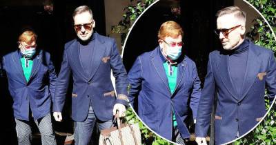 Elton John and husband David Furnish look dapper while leaving Scott's - www.msn.com