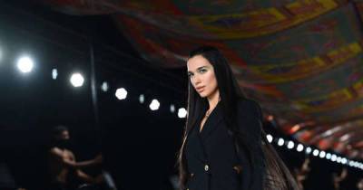Dua Lipa makes runway debut at Versace show during Milan Fashion Week - www.msn.com - Italy